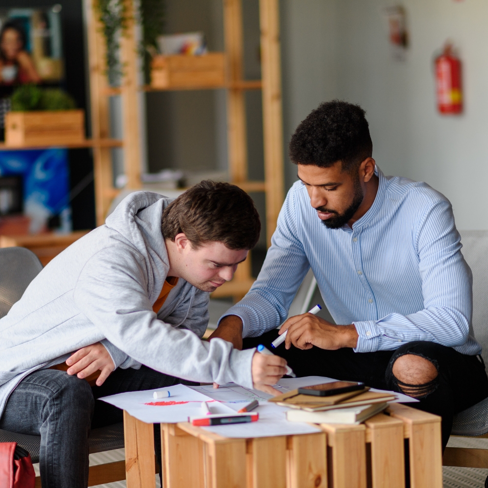 Caregiver communicating with child using sign language