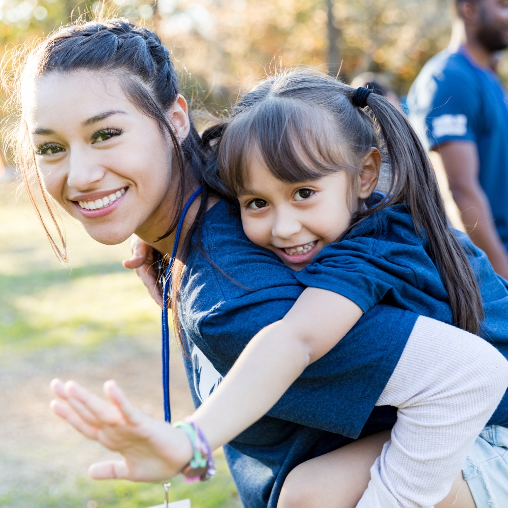 Caring volunteer with special needs child